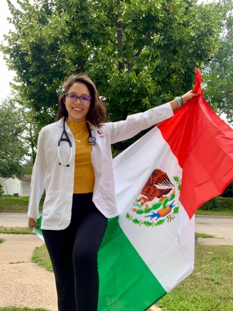 Regina Martinez Holding Mexican Flag